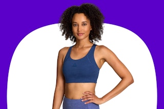Model wearing the Dark Denim Heather Reebok Women's Medium Impact Reflex Bra