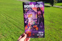 hand holding sams club sept isb booklet