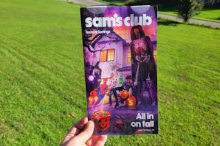 hand holding sams club sept isb booklet