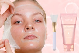 A young woman peels off a night wrapping collagen mask next to a brush for applying the mask and a tube of mask