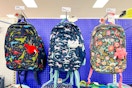 cat & jack backpacks sitting on a target shelf