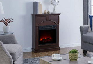 dark brown electric fireplace in a sitting room