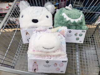 3 kids cozy critter wraps in a cart: polar bear, dinosaur, and unicorn