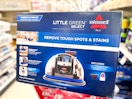 bissell little green mini sitting on a target cart