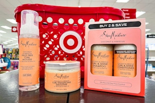 4 sheamoisture hair care products sitting in front of a target basket