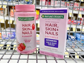 A variety of Nature's Bounty Vitamins sitting in a store cart.