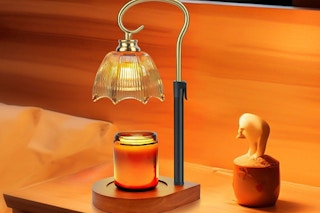 a candle warmer lamp on a nightstand