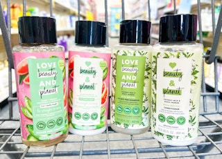 four Love Beauty and Planet hair care products in shopping cart