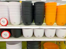 target self watering planters sitting on a target shelf