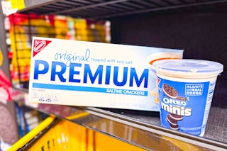 dollar general premium saltine crackers and oreo minis on store shelf