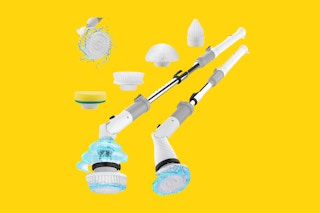 An electric spin scrubber with several brush heads and a telescoping handle is shown spinning.