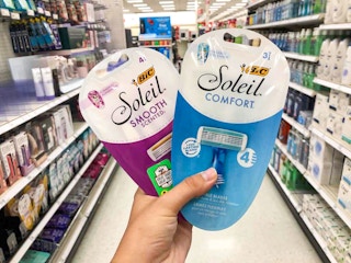 hand holding 2 packs of bic razors at target