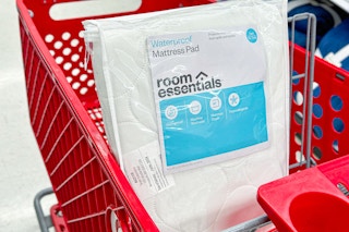 room essentials mattress pad sitting in a target cart