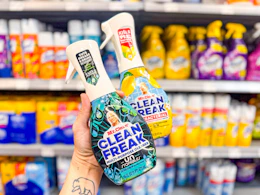 hand holding two bottles of Mr. Clean Clean Freak