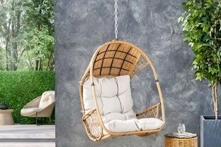Lifestyle image of Noble House Patio Swing Chair (patio setting)