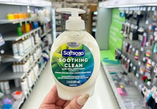 hand holding softsoap hand soap