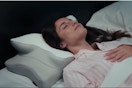 Woman sleeping on memory foam pillow.