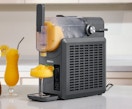 a slushie machine pouring out a drink
