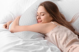 Woman using Memory Foam Pillows in bed