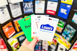 hand holding gift cards at dollar general