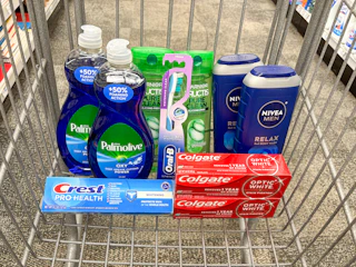 palmolive dish soap, crest and colgate toothpaste, garnier shampoo, nivea body wash in a cart