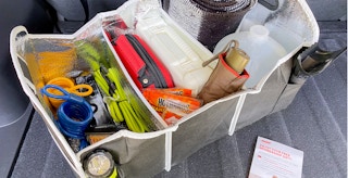 aarp free trunk organizer new member gift with supplies and information card in trunk