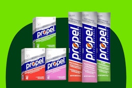 Three boxes with 10 packs each of Propel drink mix in watermelon, raspberry lemonade, and kiwi strawberry
