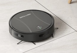 black robot vacuum and mop cleaning the floor