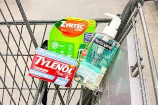 shopping cart with zyrtec, tylenol, and neutrogena products