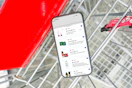 smartphone in a shopping cart displaying 1-clip coupons in the kcl app