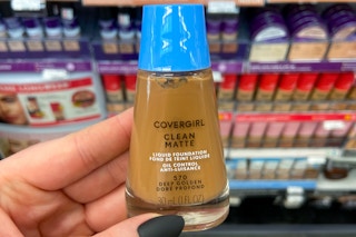 hand holding a bottle of covergirl clean matte foundation
