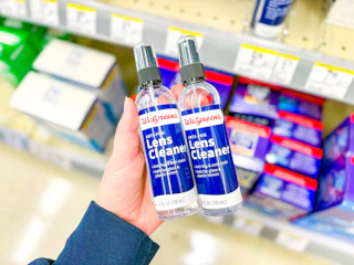 hand holding lens cleaner in walgreens