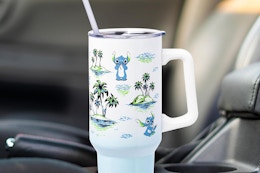 silver buffalo disney stitch tumbler in a car