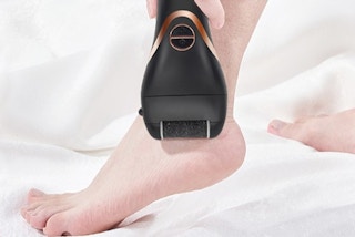 A woman using a foot file callus