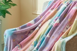 unicorn blanket draped on chair