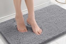 Feet on Chenille Bathroom Rug 