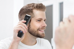 Person Trimming their Hair