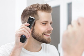 Person Trimming their Hair