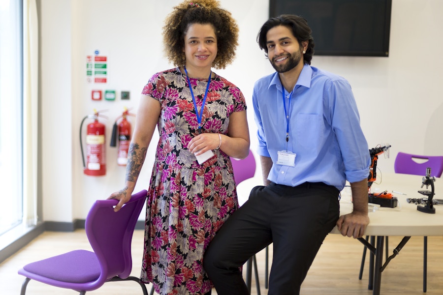 Two teachers inside a classroom