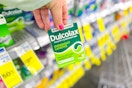 person holding a box of dulcolax laxatives