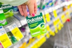 person holding a box of dulcolax laxatives
