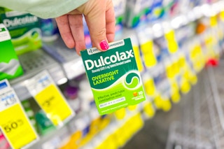 person holding a box of dulcolax laxatives