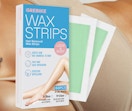 a box with green wax strips 
