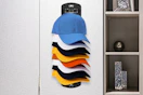 a hat organizer on a wall