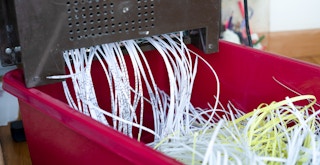 A shredder shredding documents