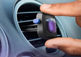 a car air freshener on a car vent