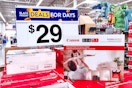 Canon Printers under $29 Black Friday sale sign in Walmart store