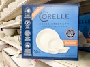 corelle 16-piece dinnerware set sitting on a target shelf