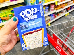 hand holding pop-tarts in cvs