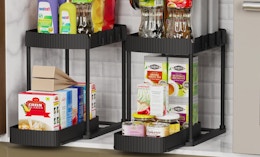 two 2-tier organizers with household items on them